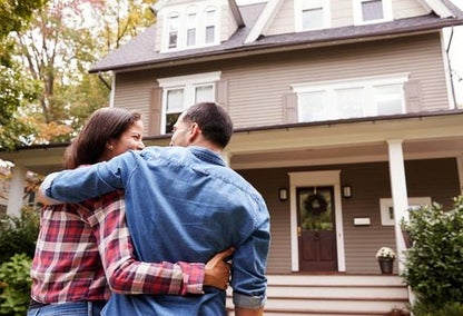 A couple who is just moving into a new home