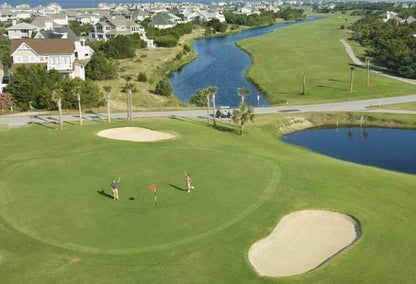 Golf courses surrounded by ponds