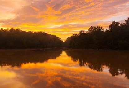 Sunset hitting the reflection of a beautiful lake in Summer Cove, NC