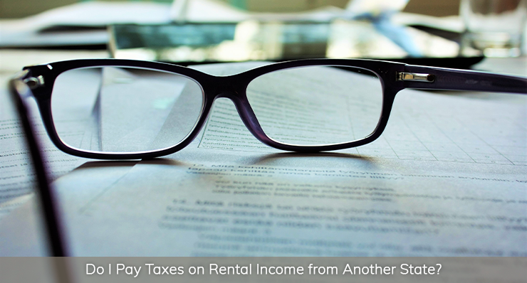 do I pay taxes on rental income from another state landmark realty group